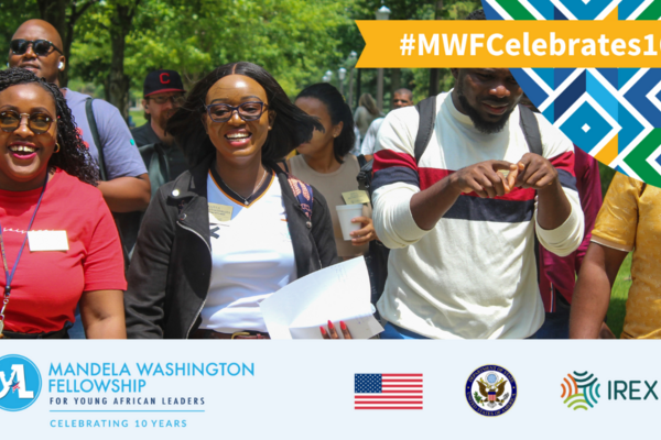 Banner that reads #MWFcelebrates10 with a photo of MWF alum smiling and walking towards the camera.